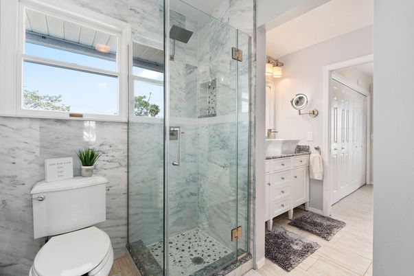 Bathroom, Glass Shower, Interior, Marble Walls, Wood Texture Flooring