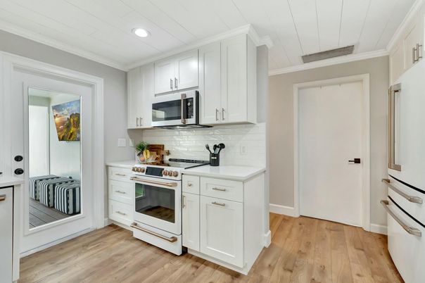 Interior, Kitchen, Recessed Lighting, Stainless Steel Appliances, Wood Texture Flooring