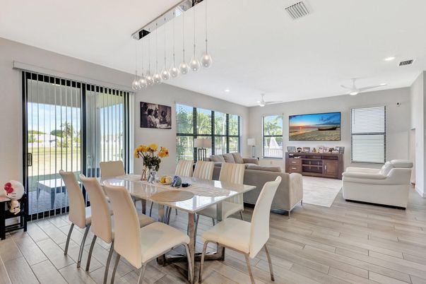 Dining room, Interior, Living room, Pendant Lights, Recessed Lighting, Wood Texture Flooring
