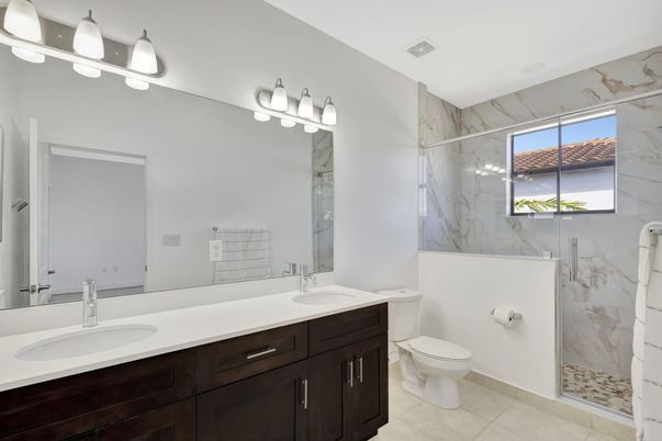 Bathroom, Dual Sink Vanities, Glass Shower, Interior, Marble Walls