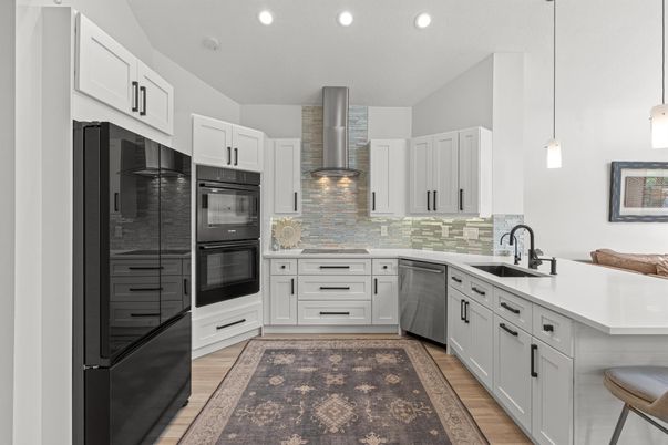 Interior, Kitchen, Pendant Lights, Recessed Lighting, Stainless Steel Appliances, Wood Texture Flooring
