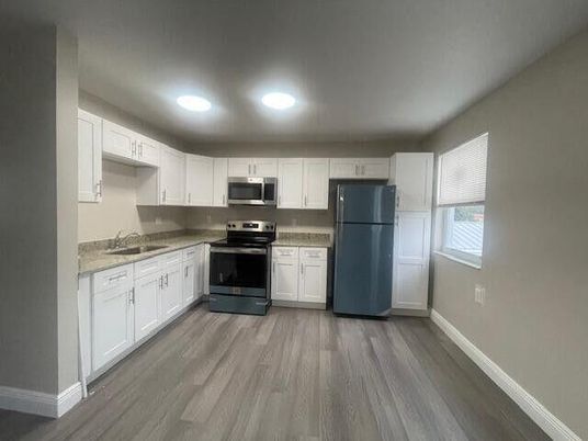 Interior, Kitchen, Recessed Lighting, Stainless Steel Appliances, Wood Texture Flooring