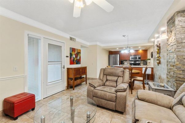 Dining room, Interior, Kitchen, Living room, Pendant Lights, Recessed Lighting, Stainless Steel Appliances, Stone Walls