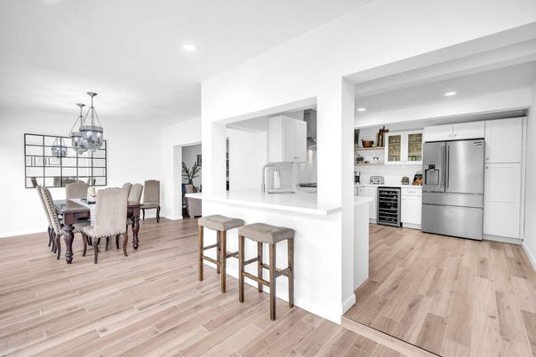 Dining room, Interior, Kitchen, Pendant Lights, Recessed Lighting, Stainless Steel Appliances, Wood Texture Flooring