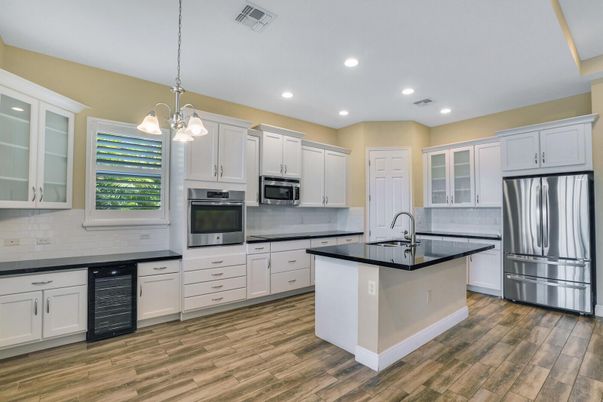 Interior, Kitchen, Pendant Lights, Recessed Lighting, Stainless Steel Appliances, Wood Texture Flooring
