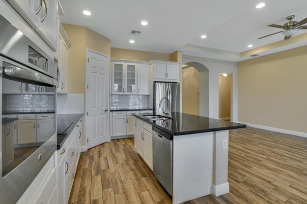 Interior, Kitchen, Recessed Lighting, Stainless Steel Appliances, Wood Texture Flooring