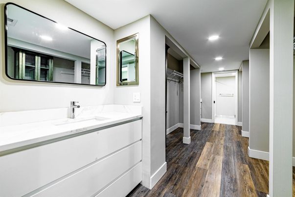 Bathroom, Dual Sink Vanities, Interior, Recessed Lighting, Walk-in Closets, Wood Texture Flooring