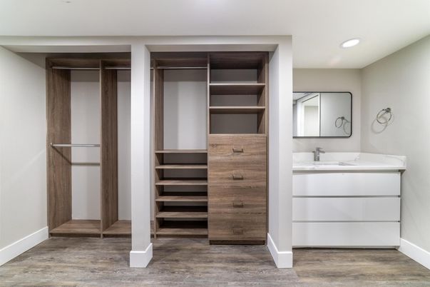 Bathroom, Dual Sink Vanities, Interior, Recessed Lighting, Walk-in Closets, Wood Texture Flooring