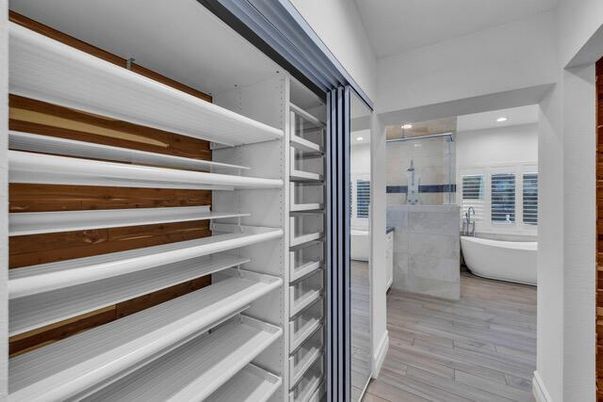 Bathroom, Free Standing Baths, Glass Shower, Interior, Recessed Lighting, Walk-in Closets, Wood Texture Flooring