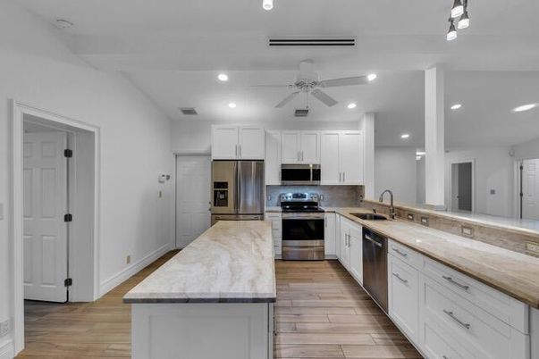 Interior, Kitchen, Recessed Lighting, Stainless Steel Appliances, Wood Texture Flooring