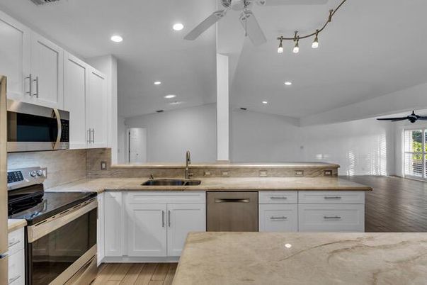 Interior, Kitchen, Recessed Lighting, Stainless Steel Appliances, Wood Texture Flooring