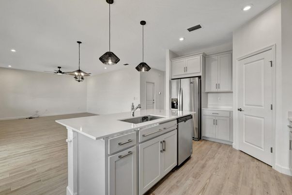 Interior, Kitchen, Pendant Lights, Recessed Lighting, Stainless Steel Appliances, Wood Texture Flooring