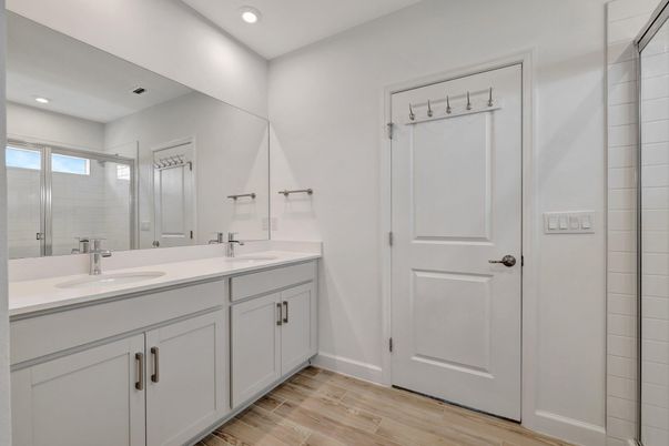 Bathroom, Dual Sink Vanities, Interior, Recessed Lighting, Wood Texture Flooring