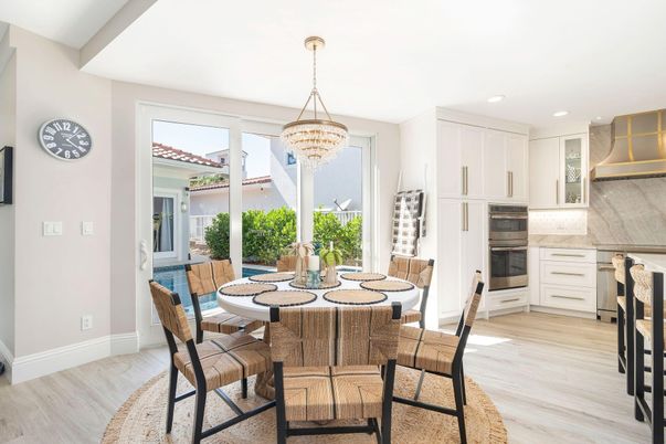 Chandelier, Dining room, Interior, Kitchen, Recessed Lighting, Stainless Steel Appliances, Wood Texture Flooring