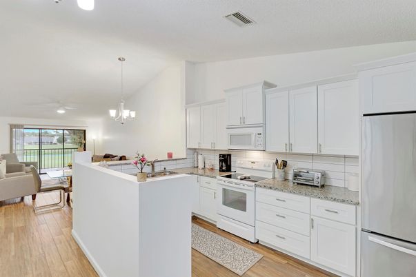 Dining room, Interior, Kitchen, Living room, Pendant Lights, Recessed Lighting, Wood Texture Flooring