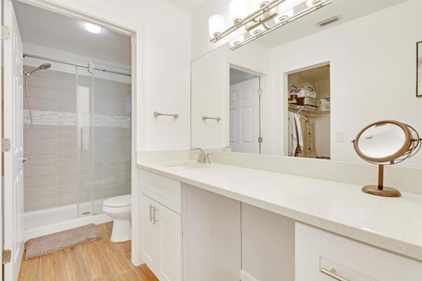 Bathroom, Dual Sink Vanities, Glass Shower, Interior, Wood Texture Flooring