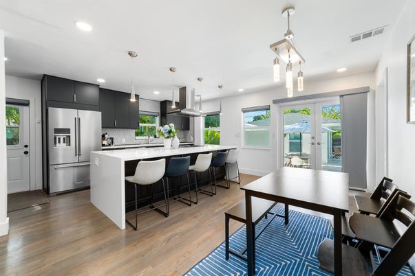 Dining room, Interior, Kitchen, Pendant Lights, Recessed Lighting, Stainless Steel Appliances, Wood Texture Flooring