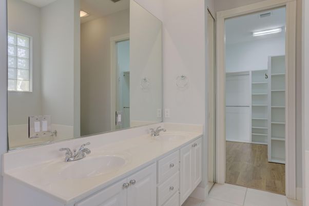 Bathroom, Dual Sink Vanities, Interior, Walk-in Closets, Wood Texture Flooring