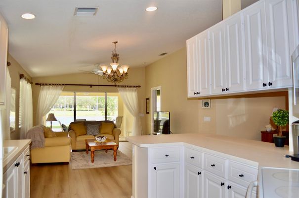 Chandelier, Interior, Living room, Recessed Lighting, Wood Texture Flooring