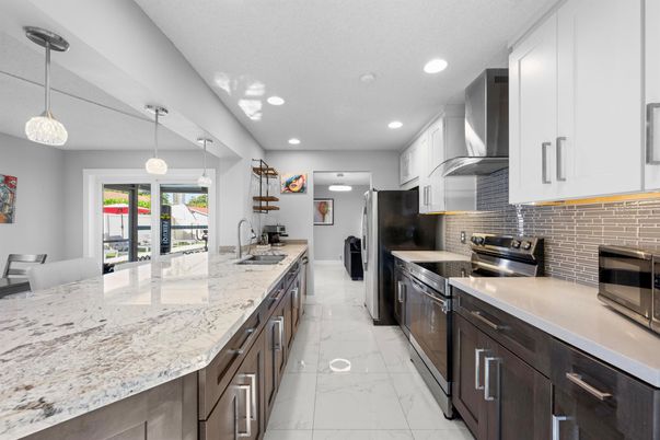 Interior, Kitchen, Marble, Pendant Lights, Recessed Lighting, Stainless Steel Appliances