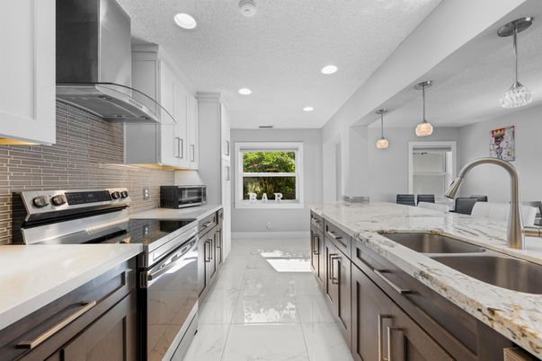 Interior, Kitchen, Marble, Pendant Lights, Recessed Lighting, Stainless Steel Appliances