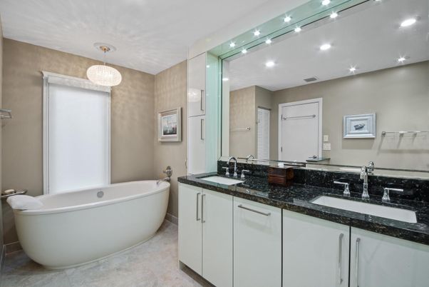 Bathroom, Chandelier, Dual Sink Vanities, Free Standing Baths, Interior, Recessed Lighting
