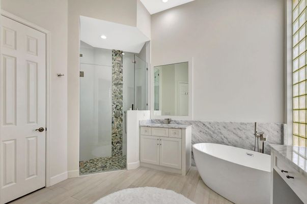 Bathroom, Dual Sink Vanities, Free Standing Baths, Glass Shower, Interior, Recessed Lighting, Wood Texture Flooring