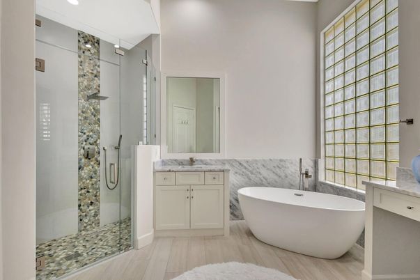 Bathroom, Dual Sink Vanities, Free Standing Baths, Glass Shower, Interior, Recessed Lighting, Wood Texture Flooring
