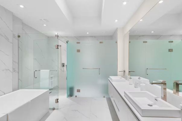 Bathroom, Dual Sink Vanities, Glass Shower, Interior, Marble, Marble Walls, Recessed Lighting