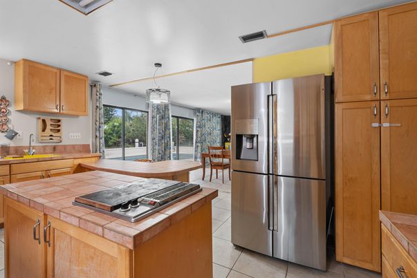 Dining room, Interior, Kitchen, Pendant Lights, Stainless Steel Appliances, Tile Countertops