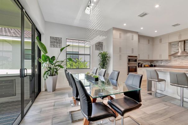 Dining room, Interior, Kitchen, Pendant Lights, Recessed Lighting, Stainless Steel Appliances, Wood Texture Flooring