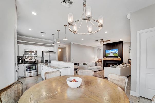 Dining room, Fireplace, Interior, Kitchen, Living room, Pendant Lights, Recessed Lighting, Stainless Steel Appliances