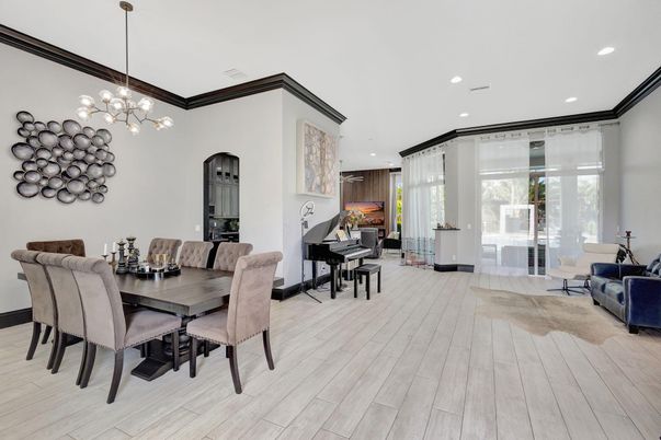 Dining room, Interior, Pendant Lights, Piano, Recessed Lighting, Wood Texture Flooring