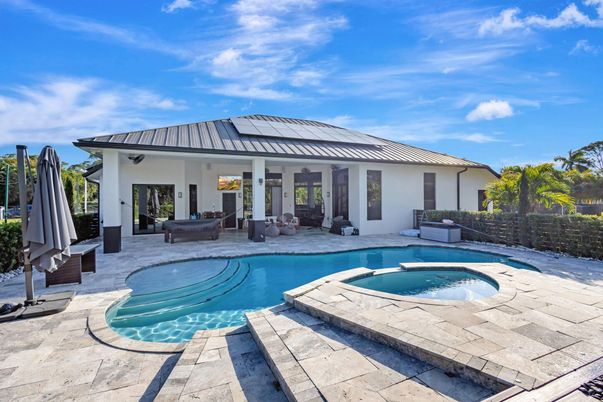Exterior, Pool, Solar Panels
