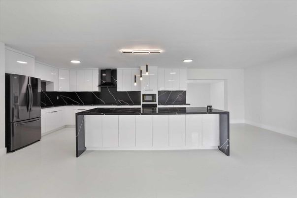 Interior, Kitchen, Marble Walls, Recessed Lighting, Stainless Steel Appliances