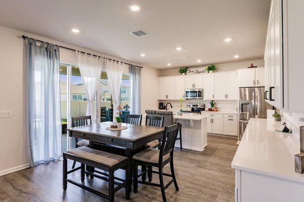 Dining room, Interior, Kitchen, Recessed Lighting, Stainless Steel Appliances, Wood Texture Flooring