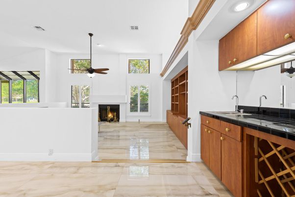 Fireplace, Interior, Kitchen, Marble, Recessed Lighting, Tile Countertops