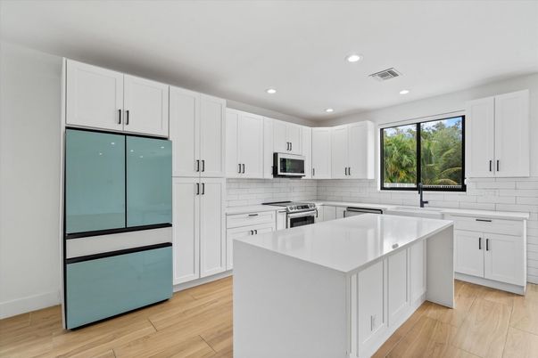 Interior, Kitchen, Recessed Lighting, Stainless Steel Appliances, Wood Texture Flooring