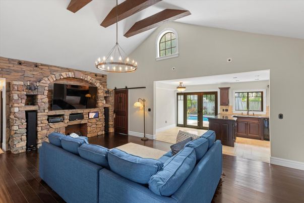 Chandelier, Fireplace, Interior, Kitchen, Living room, Pendant Lights, Stone Walls, Wooden Beams, Wood Texture Flooring