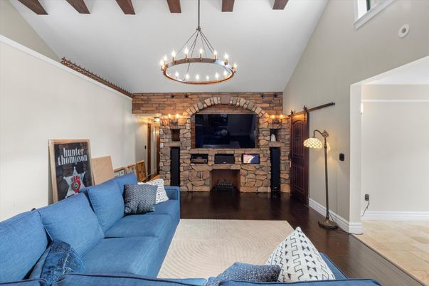 Fireplace, Interior, Living room, Pendant Lights, Stone Walls, Wooden Beams, Wood Texture Flooring