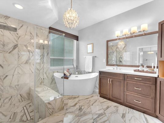 Bathroom, Chandelier, Dual Sink Vanities, Free Standing Baths, Glass Shower, Interior, Marble, Marble Walls, Recessed Lighting