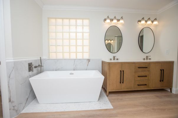 Bathroom, Dual Sink Vanities, Free Standing Baths, Interior, Marble Walls, Wood Texture Flooring