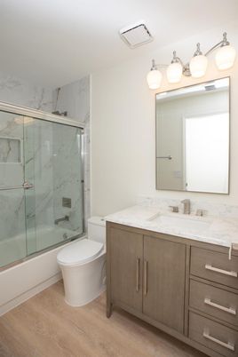 Bathroom, Glass Shower, Interior, Marble Walls, Wood Texture Flooring