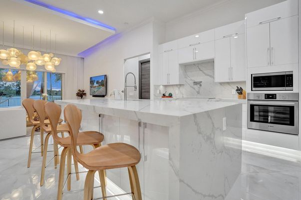 Interior, Kitchen, Marble, Marble Walls, Pendant Lights, Recessed Lighting, Stainless Steel Appliances