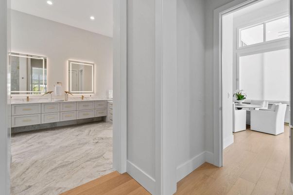 Bathroom, Dual Sink Vanities, Interior, Marble, Recessed Lighting, Wood Texture Flooring