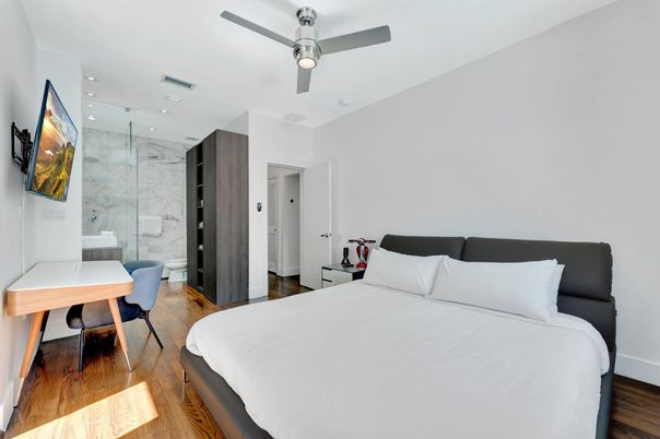 Bathroom, Bedroom, Glass Shower, Interior, Marble Walls, Recessed Lighting, Wood Texture Flooring