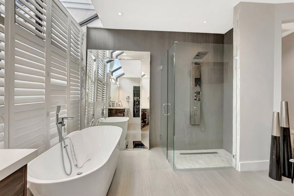 Bathroom, Free Standing Baths, Glass Shower, Interior, Recessed Lighting, Wood Texture Flooring
