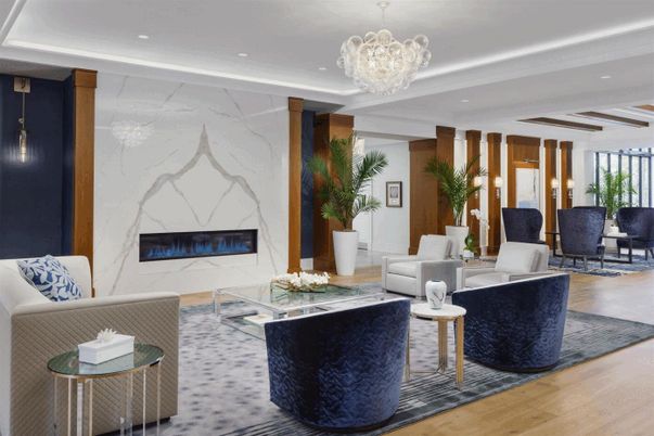 Chandelier, Dining room, Fireplace, Interior, Living room, Marble Walls, Recessed Lighting, Wood Texture Flooring