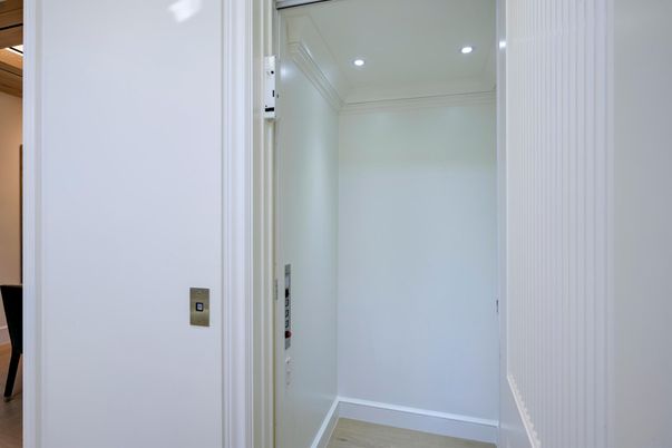 Elevator, Interior, Recessed Lighting, Wood Texture Flooring