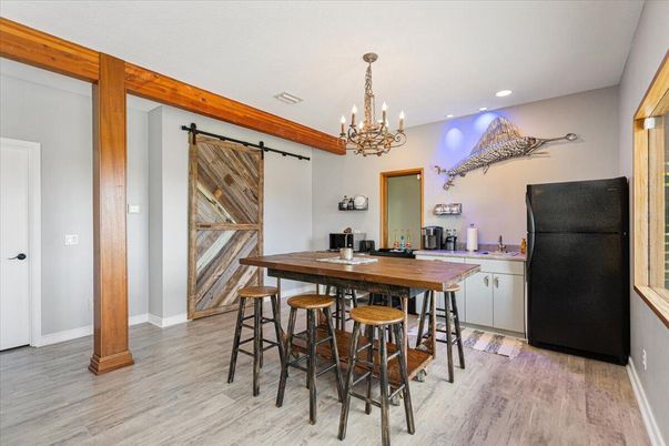 Chandelier, Dining room, Interior, Recessed Lighting, Wood Texture Flooring